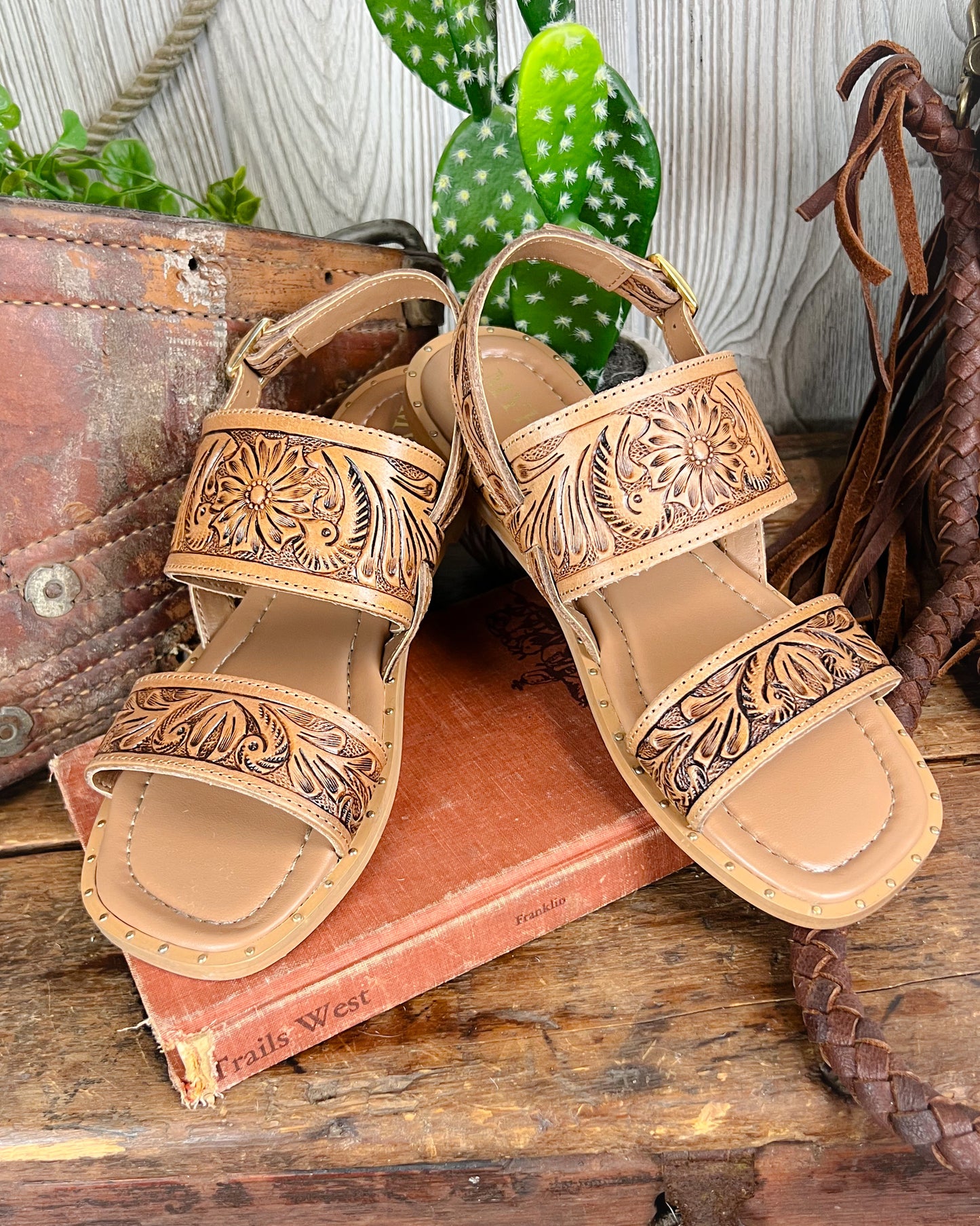 Western cowgirl tooled leather sandals with square toe, gold studs, and small heel