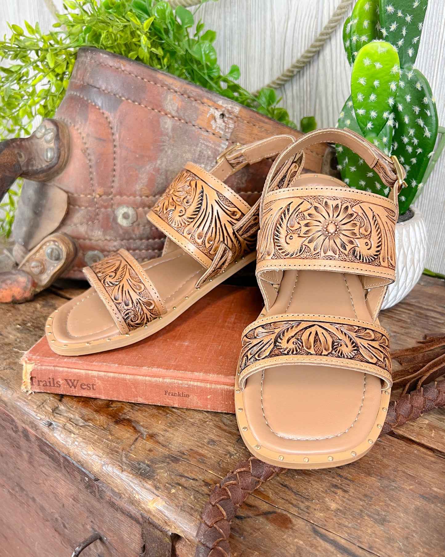 Western cowgirl tooled leather sandals with square toe, gold studs, and small heel
