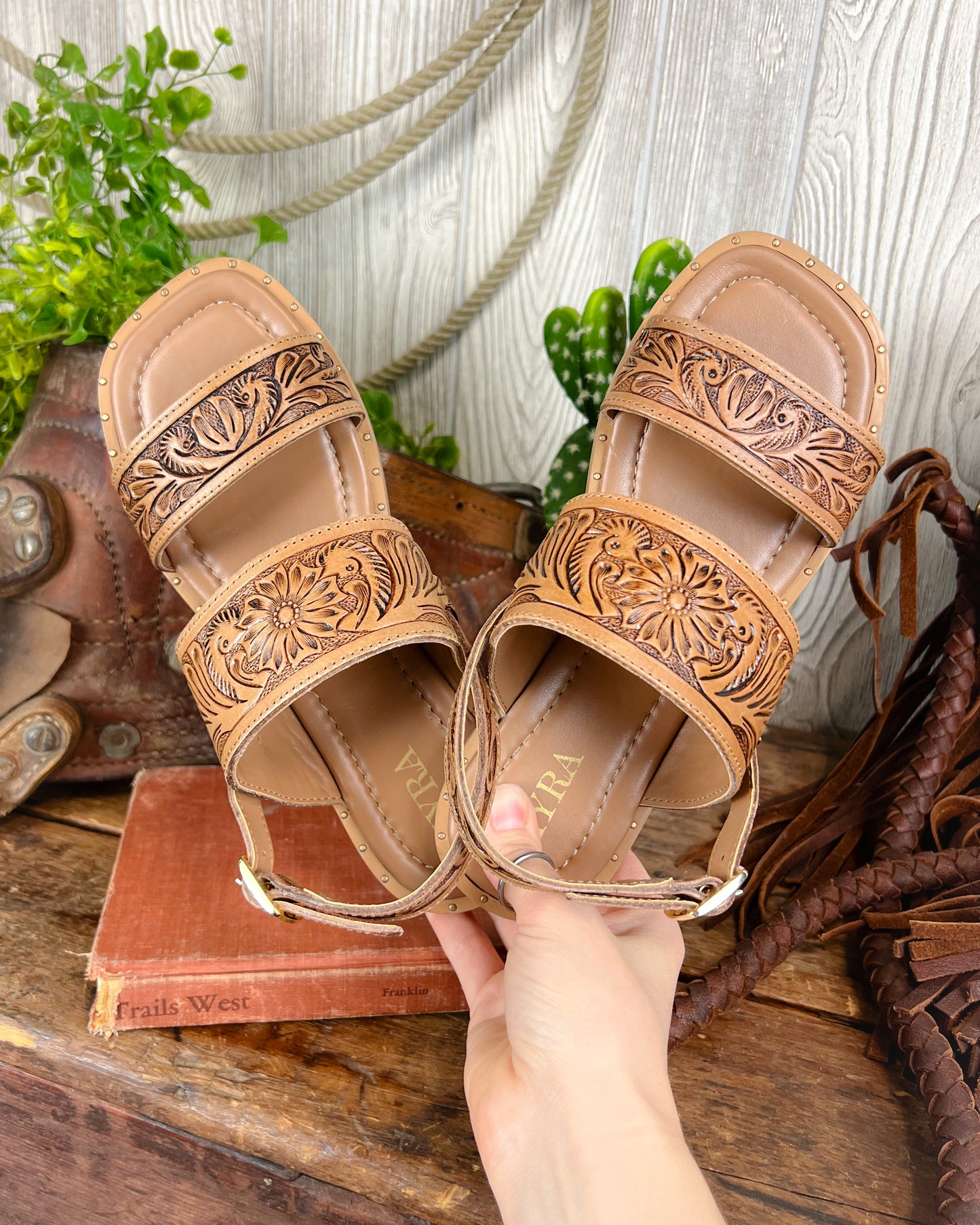 Western cowgirl tooled leather sandals with square toe, gold studs, and small heel
