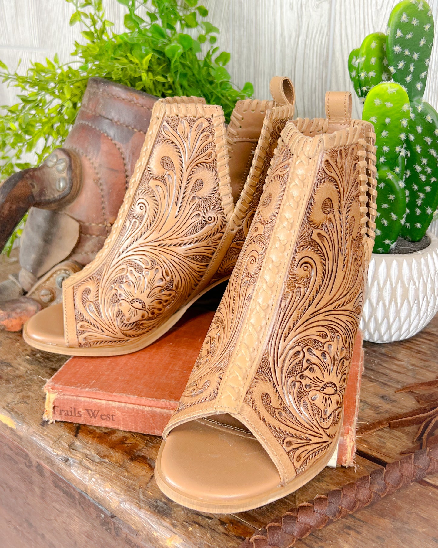 Tooled leather western high heeled booties with floral scroll design and open toe