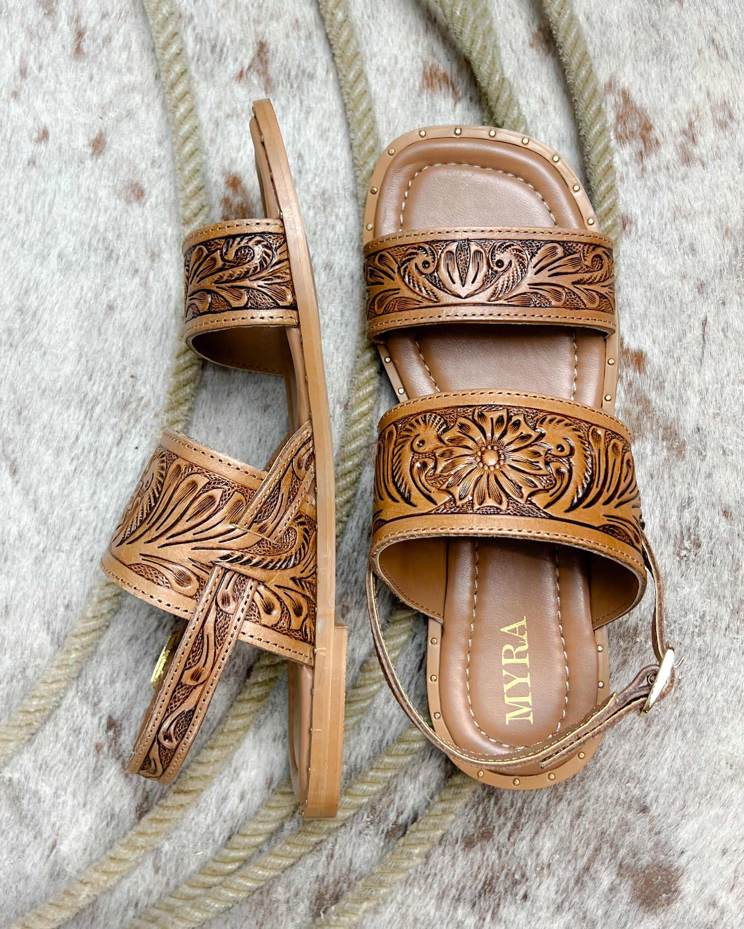 Western cowgirl tooled leather sandals with square toe, gold studs, and small heel