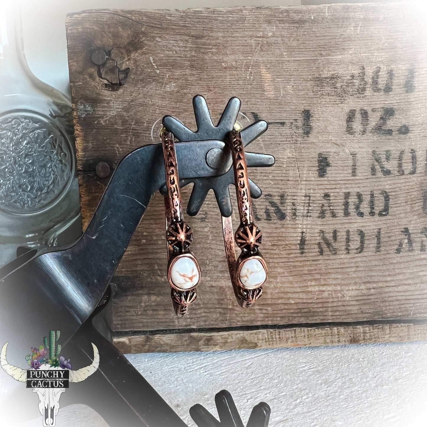 bronze semi hoop western earrings with white stone