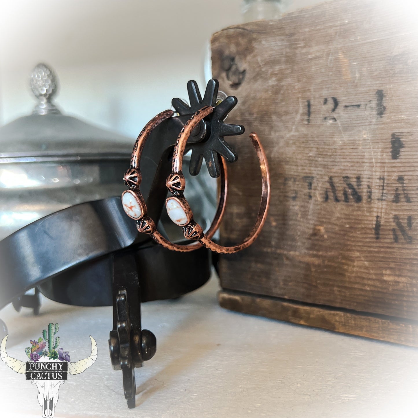bronze semi hoop western earrings with white stone