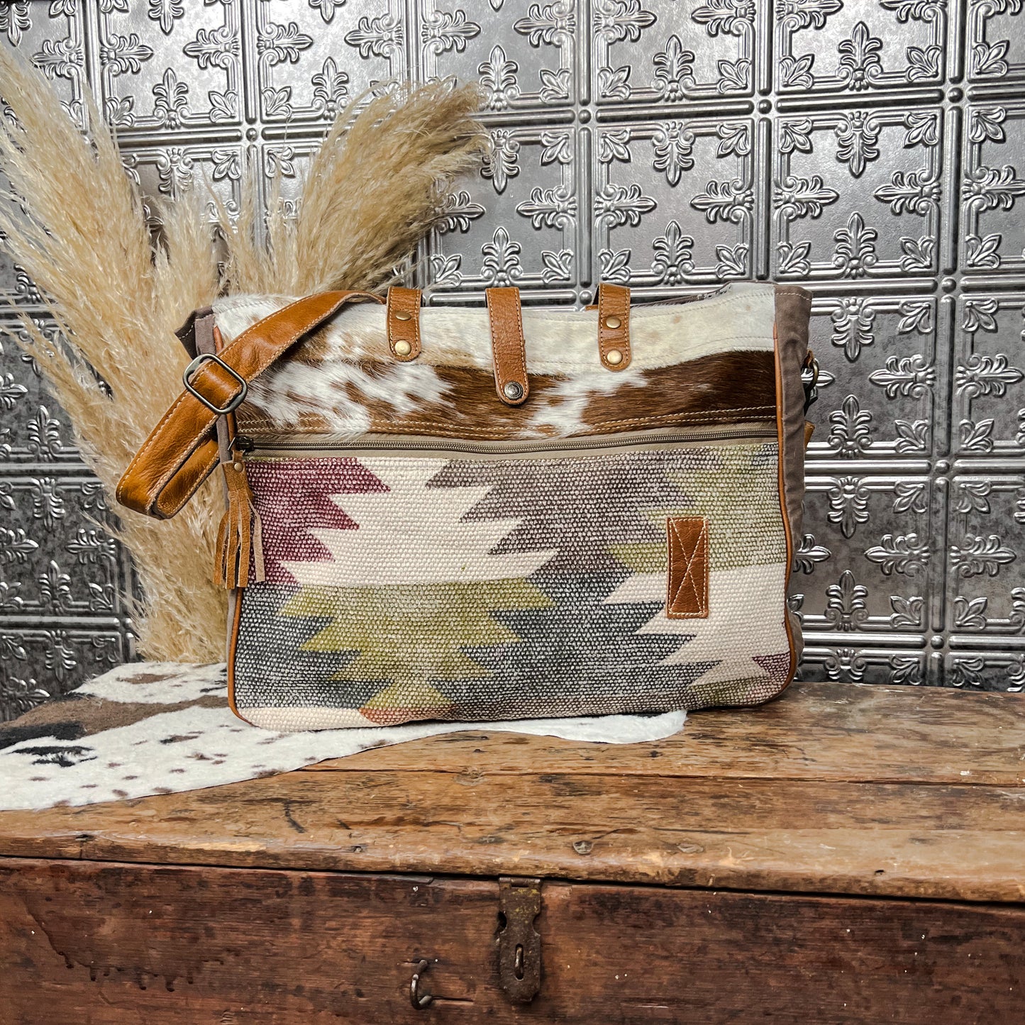 cowhide and axtec print tote weekender bag western boho boutique