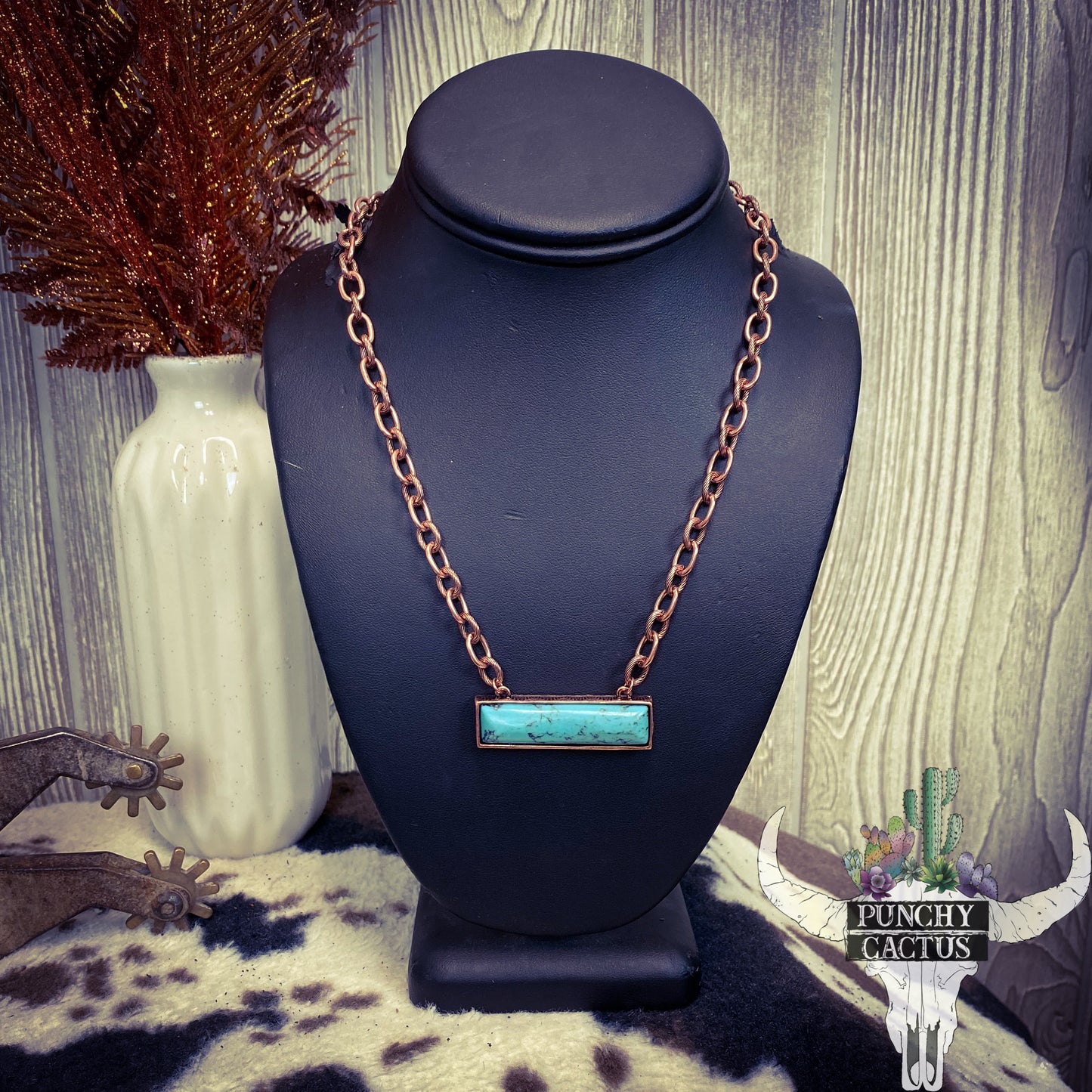 western necklace with bronze chain and turquoise bar