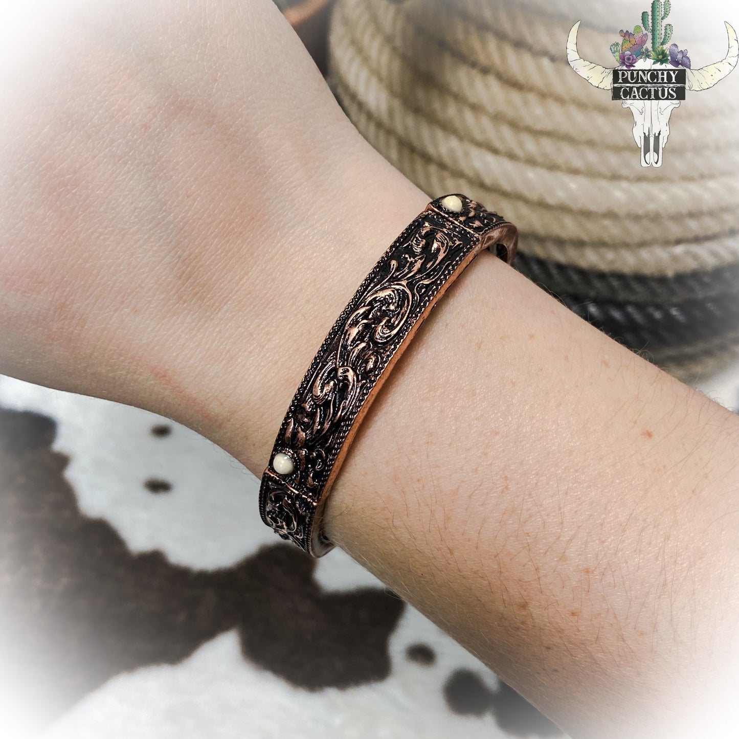 western bronze metal stretch bracelet with etching and white stones