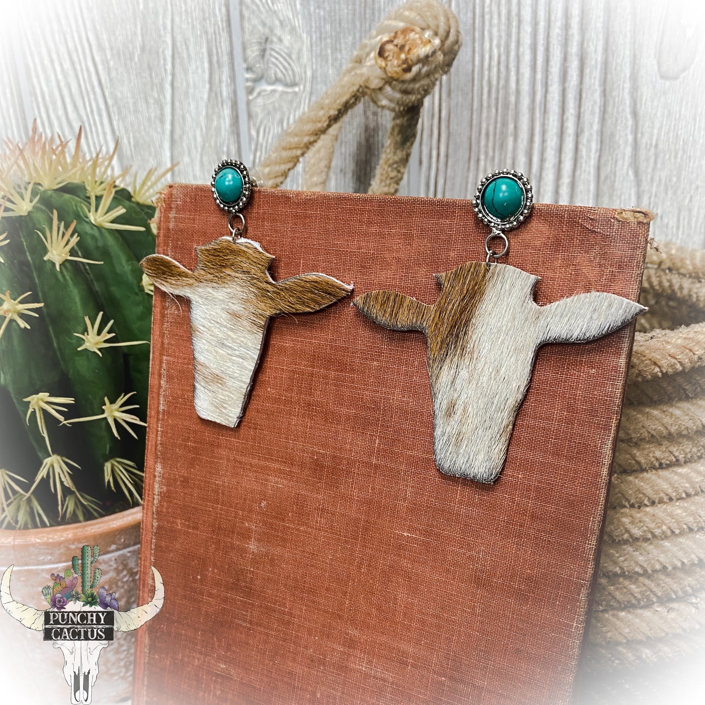 cowhide steer head earrings with turquoise stone studs