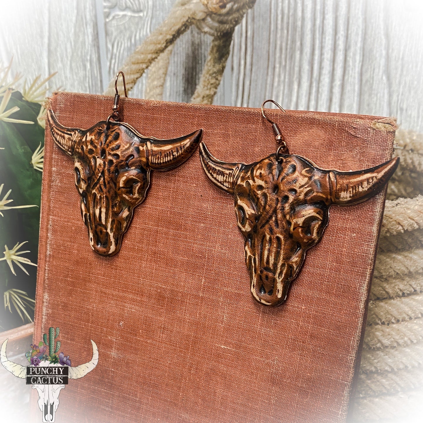 western leather earrings with bull skull earrings
