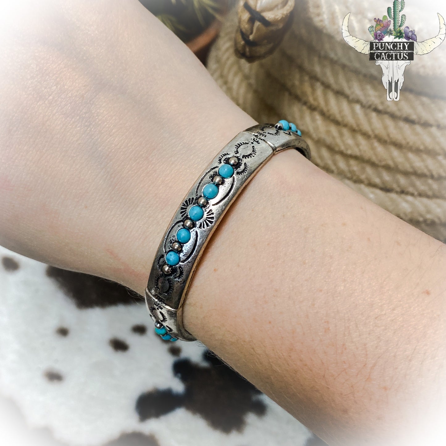 western metal stretch bracelet with etching and turquoise stones