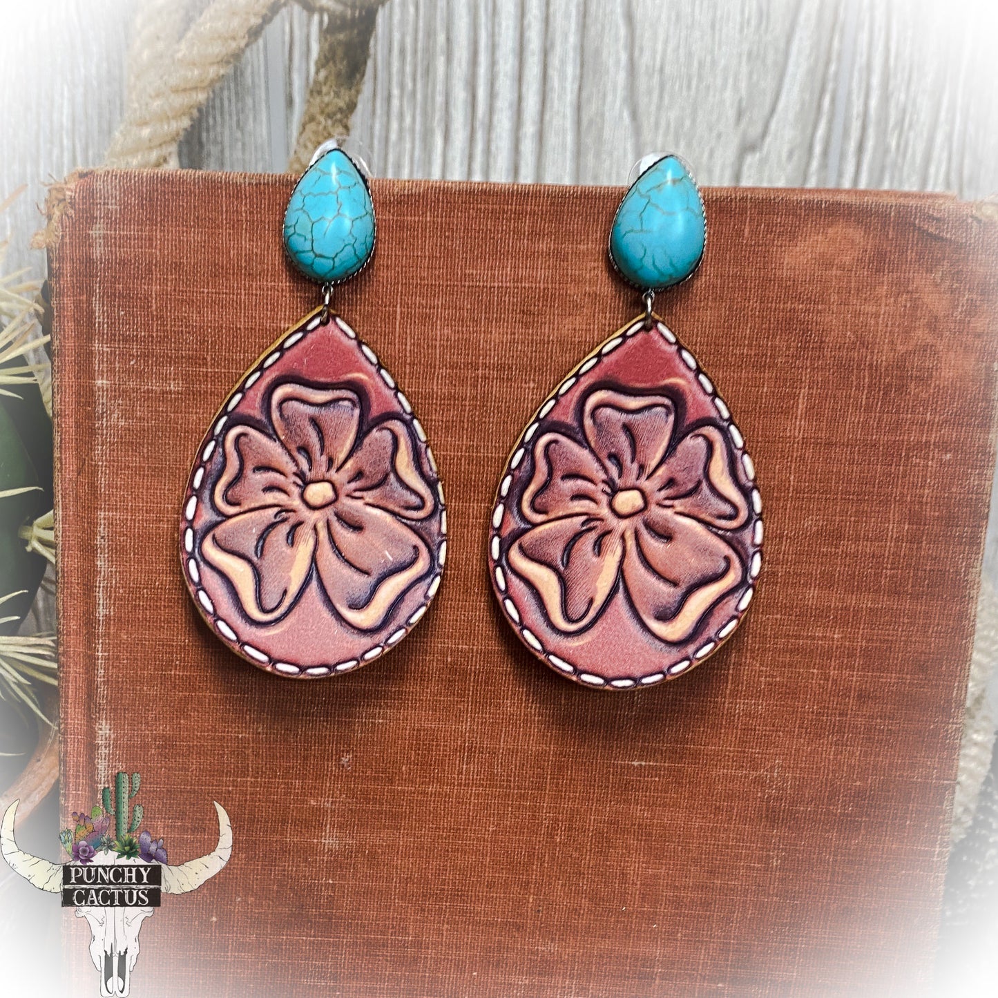 western floral tooled leather earrings with turquoise stone stud