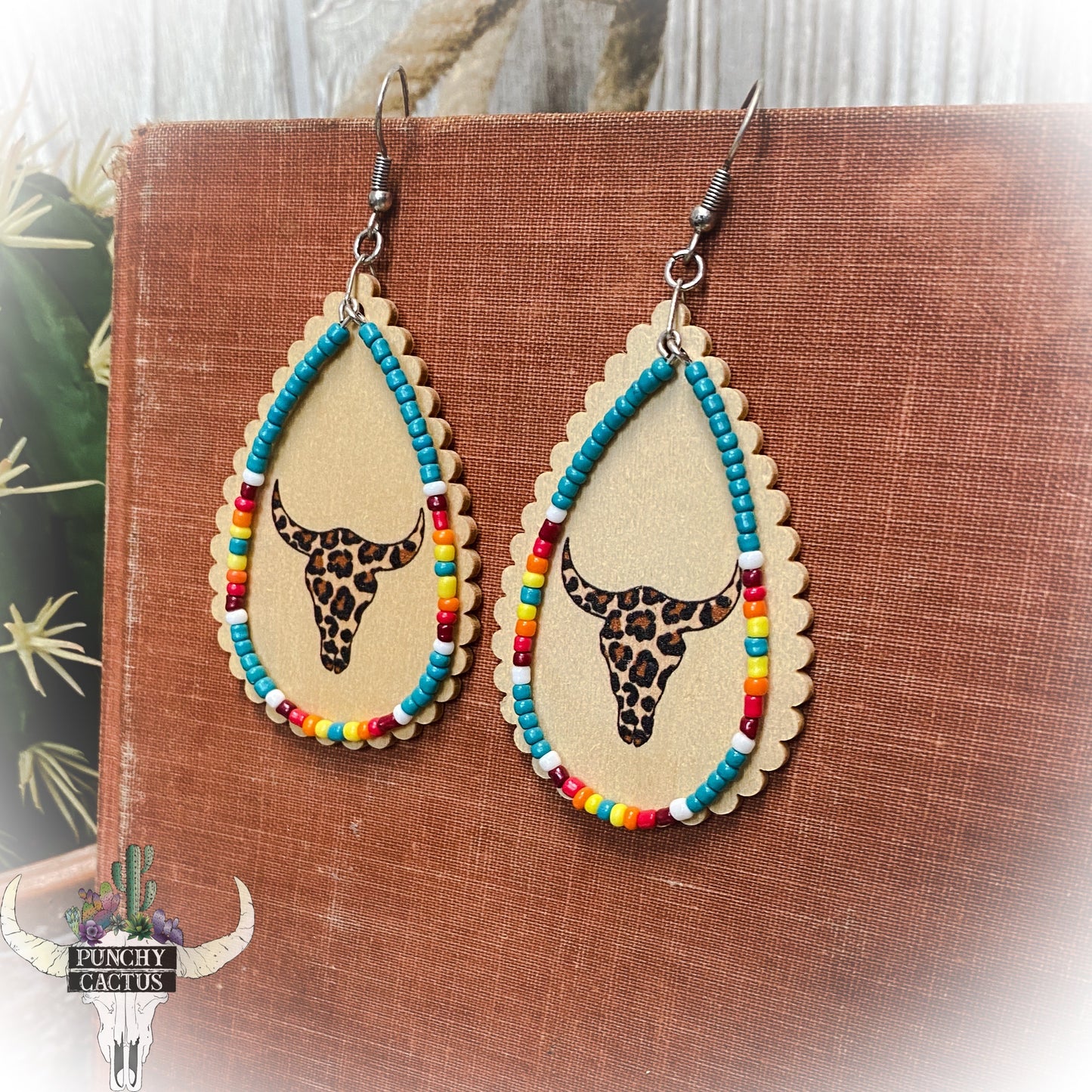 wooden western earrings with cheetah print bull skull turquoise serape seed bead dangle