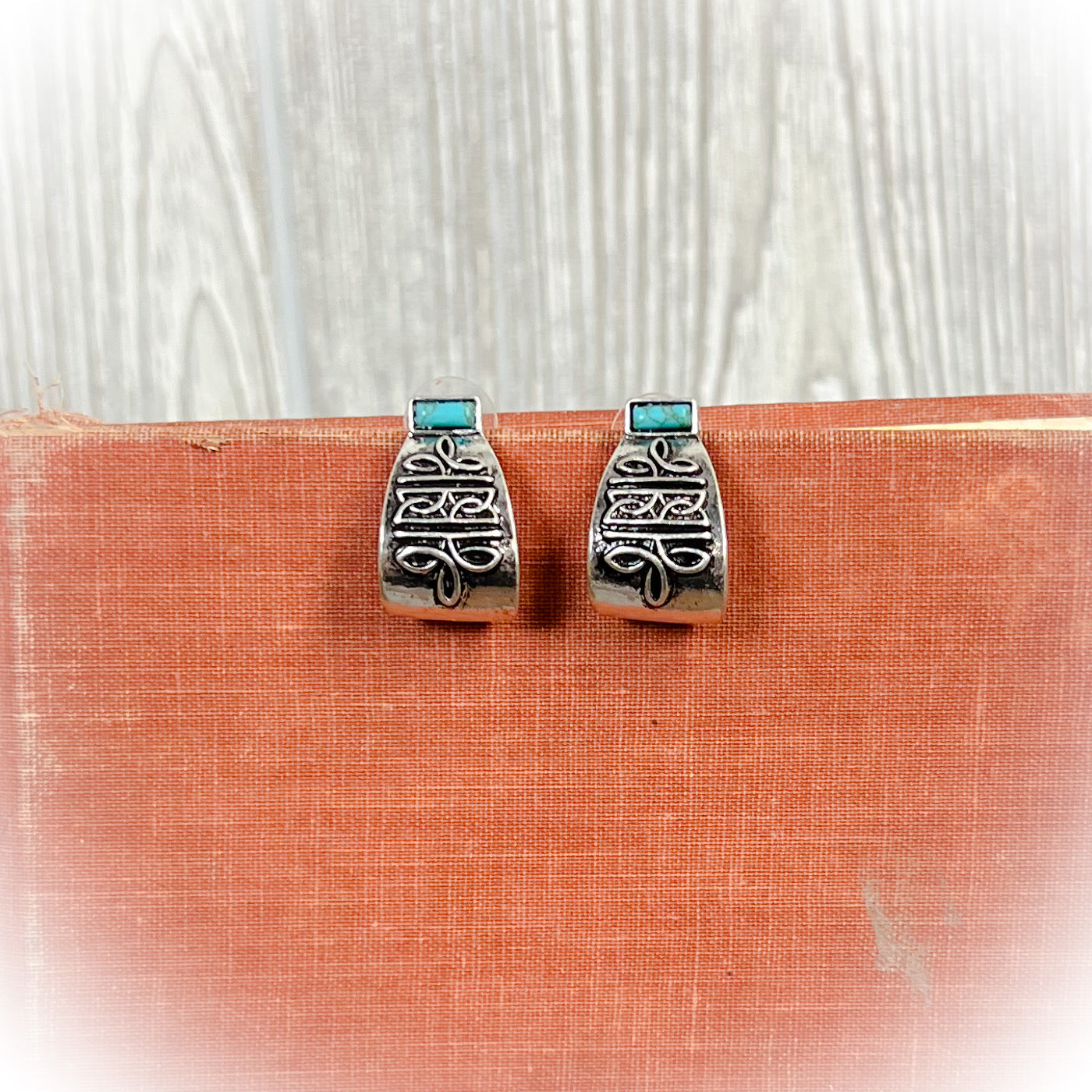 Western Boot Stitch Curled Earrings