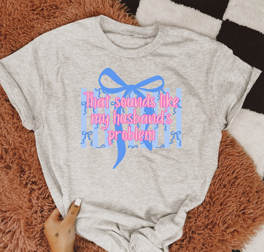 That Sounds Like My Husband’s Problem Graphic Tee Funny Wife Shirt Ash Grey Unisex Cotton Blend