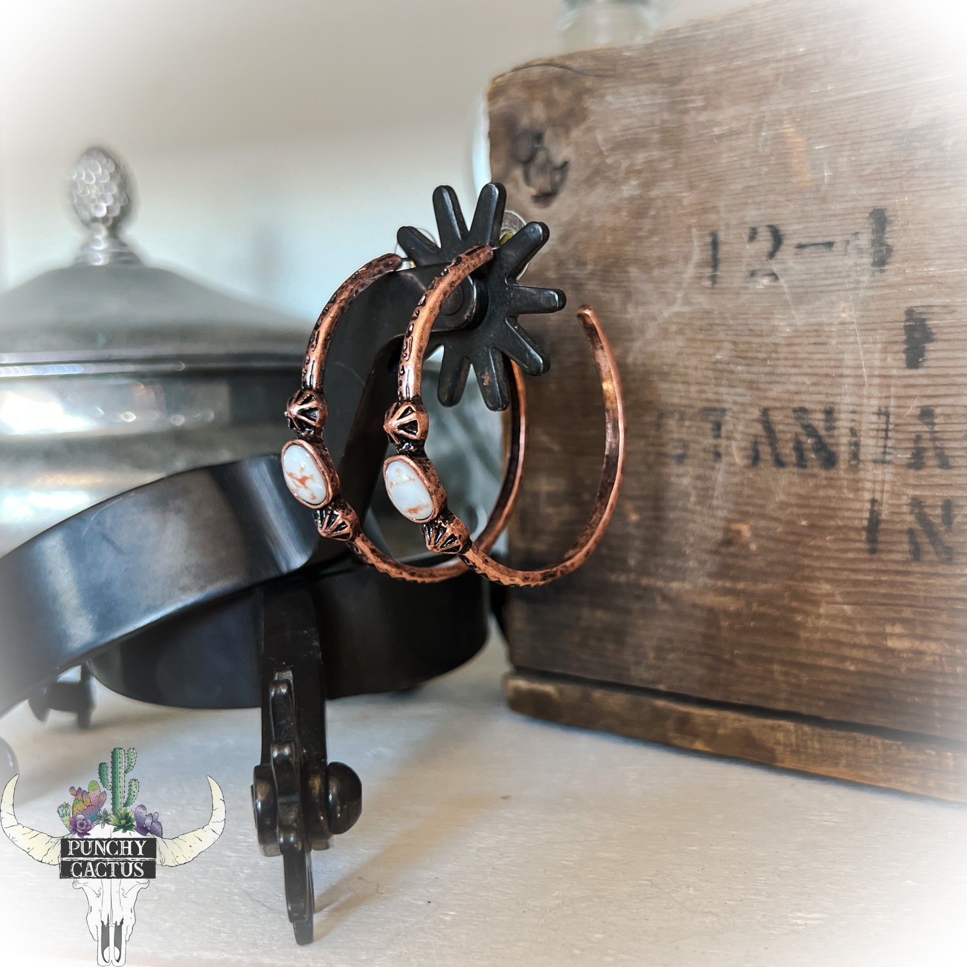 bronze  semi hoop western earrings with white stone