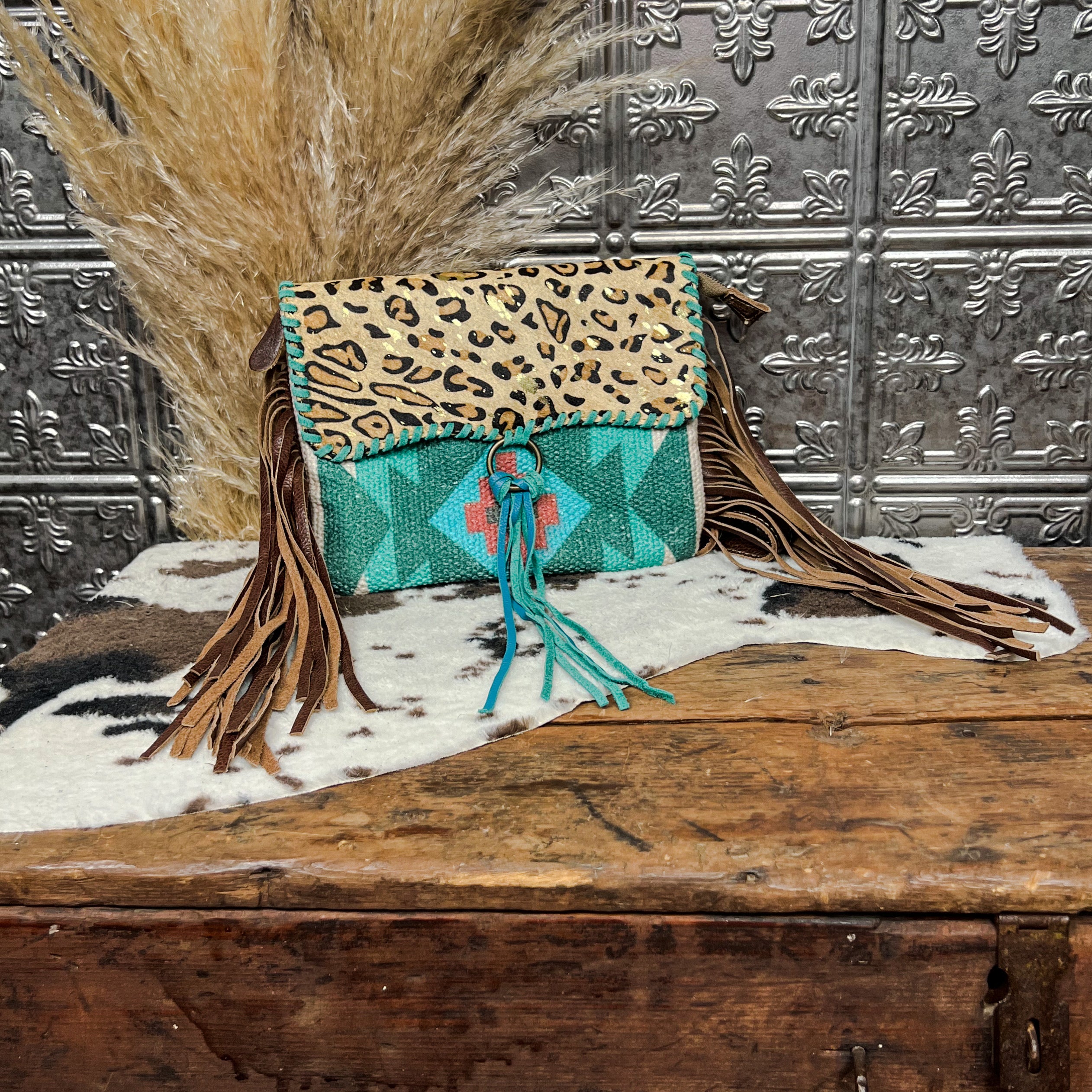 myra bag cheetah print cowhide fringe and turquoise aztec canvas 1