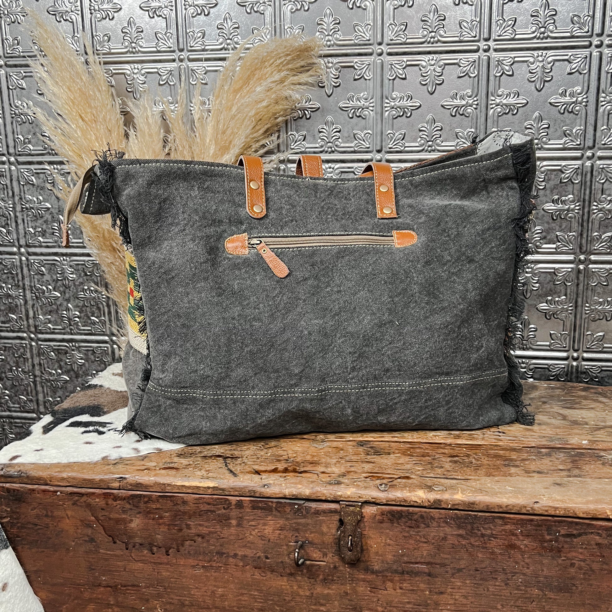 canvas and cowhide patchwork tote style weekender bag western boho boutique