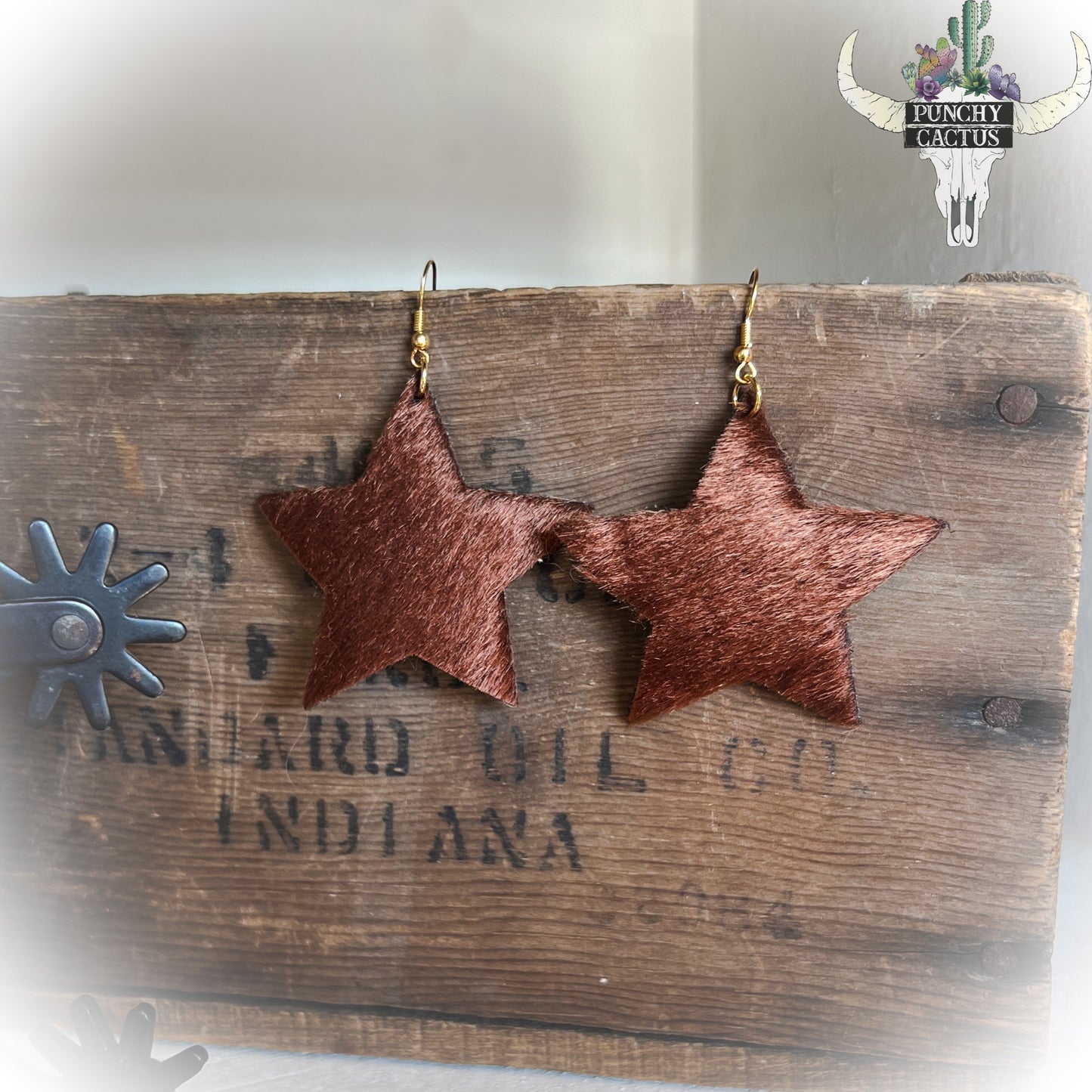 western brown cowhide star earrings