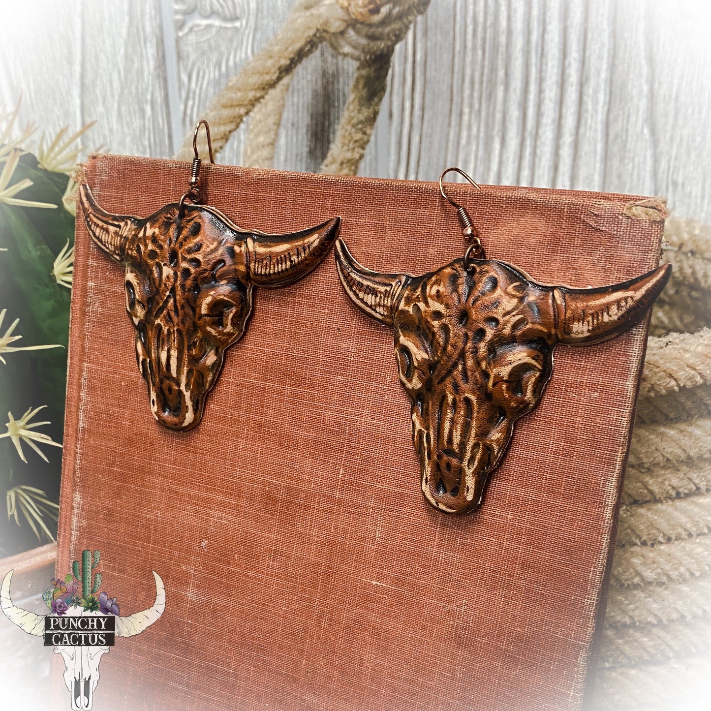 western leather earrings with bull skull earrings 