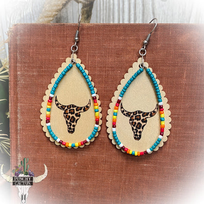 wooden western earrings with cheetah print bull skull turquoise serape seed bead dangle